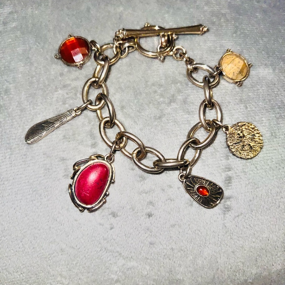 Elegant Silver Charm Bracelet with Red and Gold Accents